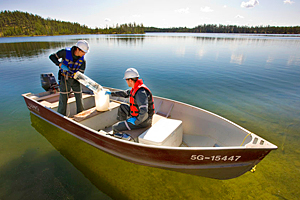 Cameco employees in a canoe